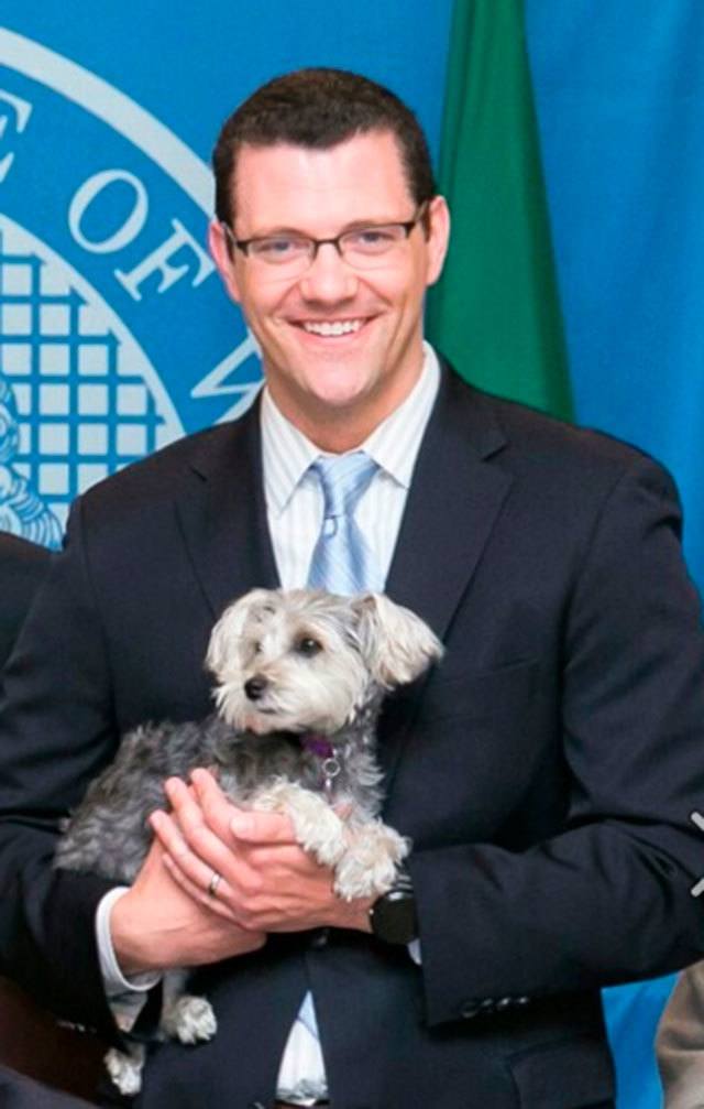 State Sen. Joe Fain and his beloved dog, Waffles. COURTESY PHOTO