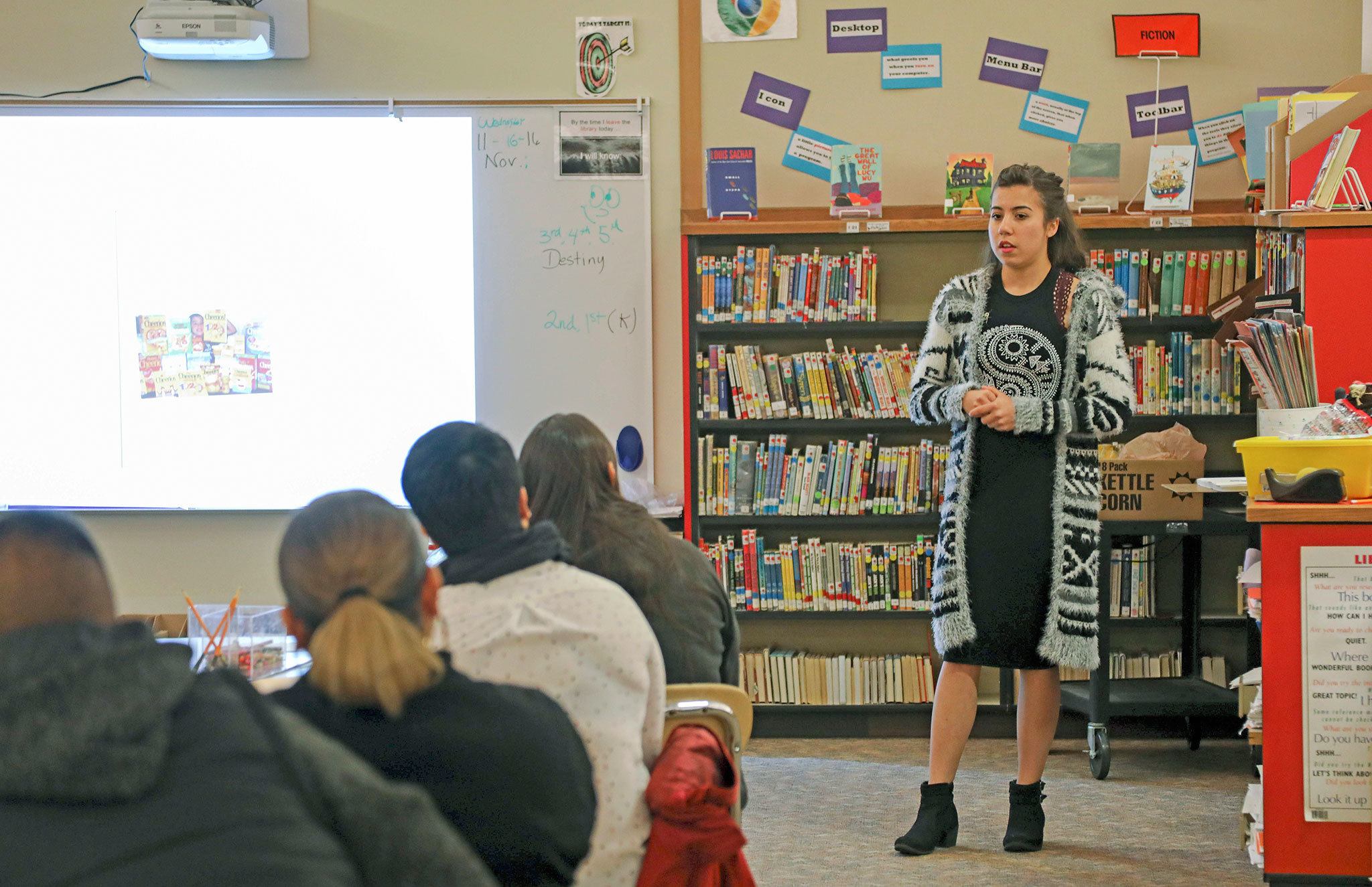 Nadia Diaz recently presents to a parent group at Lake View Elementary School. Diaz, a senior at Auburn Adventist Academy, frequently volunteers at the school, working with autistic students and their parents. COURTESY PHOTO, Heidi Baumgartner