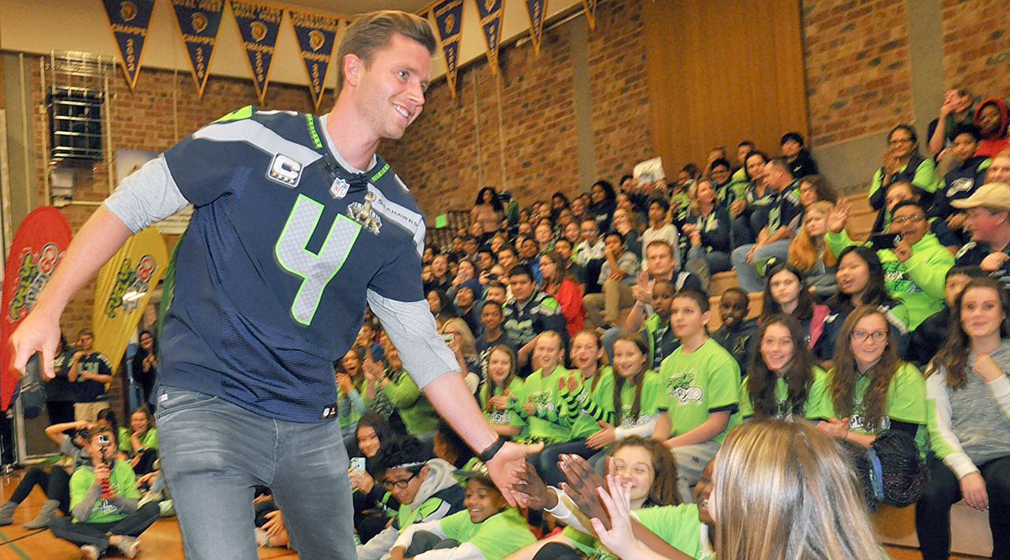 Seattle Seahawks kicker Steven Hauschka greets students at Cascade Middle School during a Fuel Up to Play 60 assembly Tuesday. RACHEL CIAMPI, Auburn Reporter