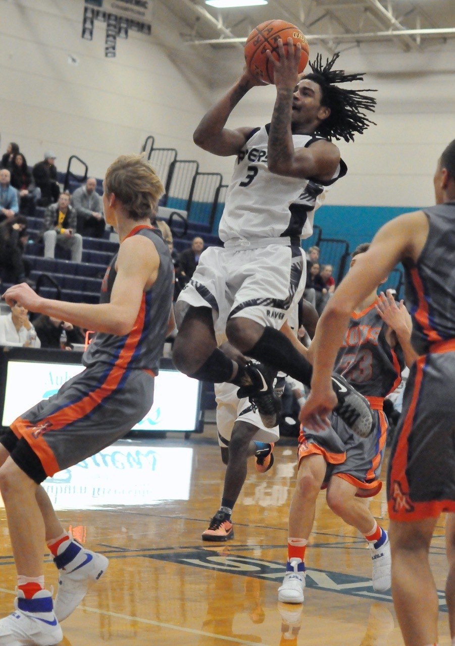 Balanced Ravens secure rivalry win against Auburn Mountainview | NPSL boys basketball