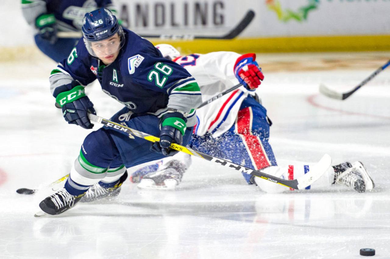 The Thunderbirds&rsquo; Nolan Volcan scrambles for the puck on ShoWare ice Tuesday night. COURTESY PHOTO, Brian Liesse/Thunderbirds