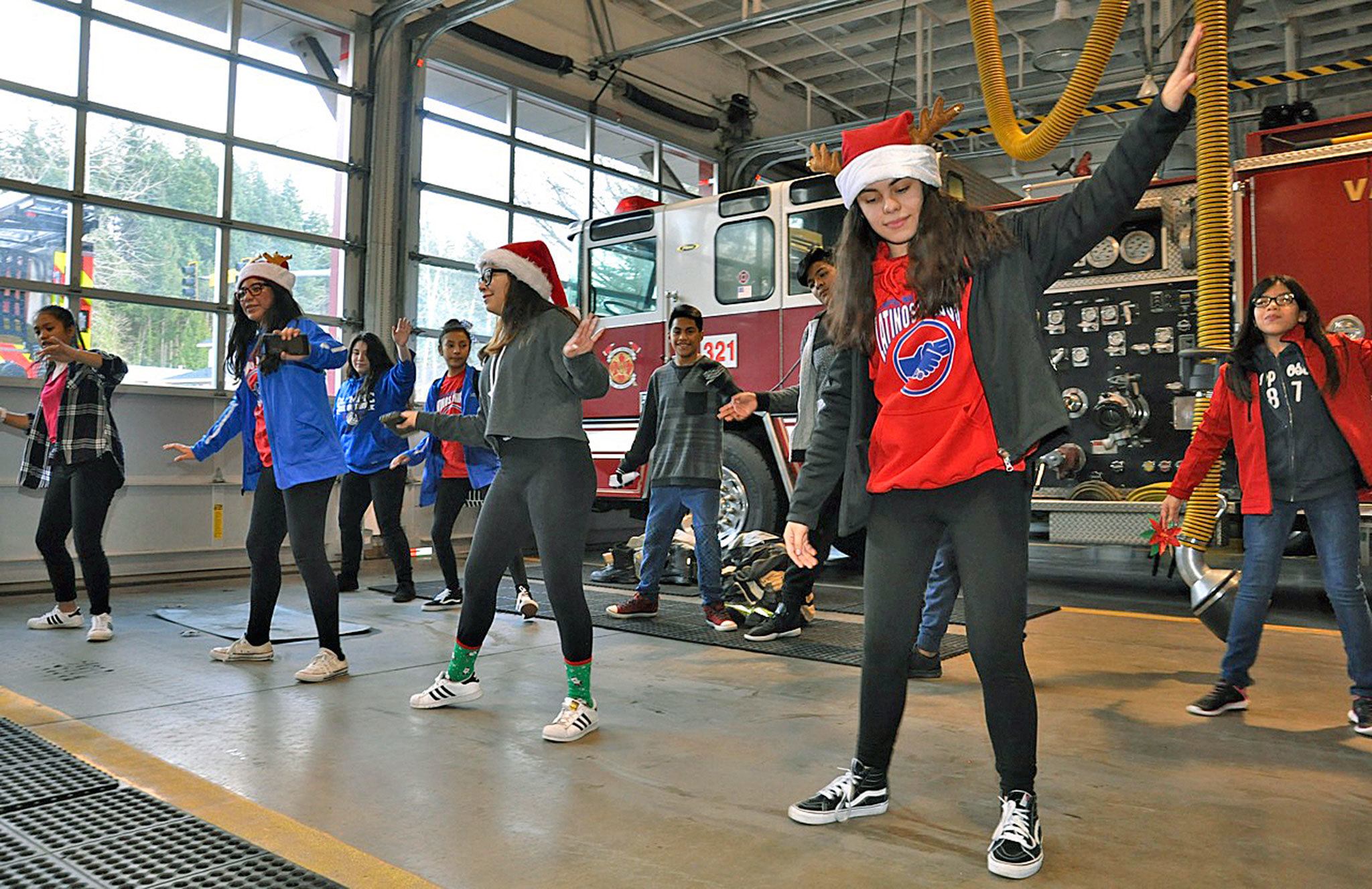 Cascade Middle School’s Latino Club dancers perform. RACHEL CIAMPI, Auburn Reporter