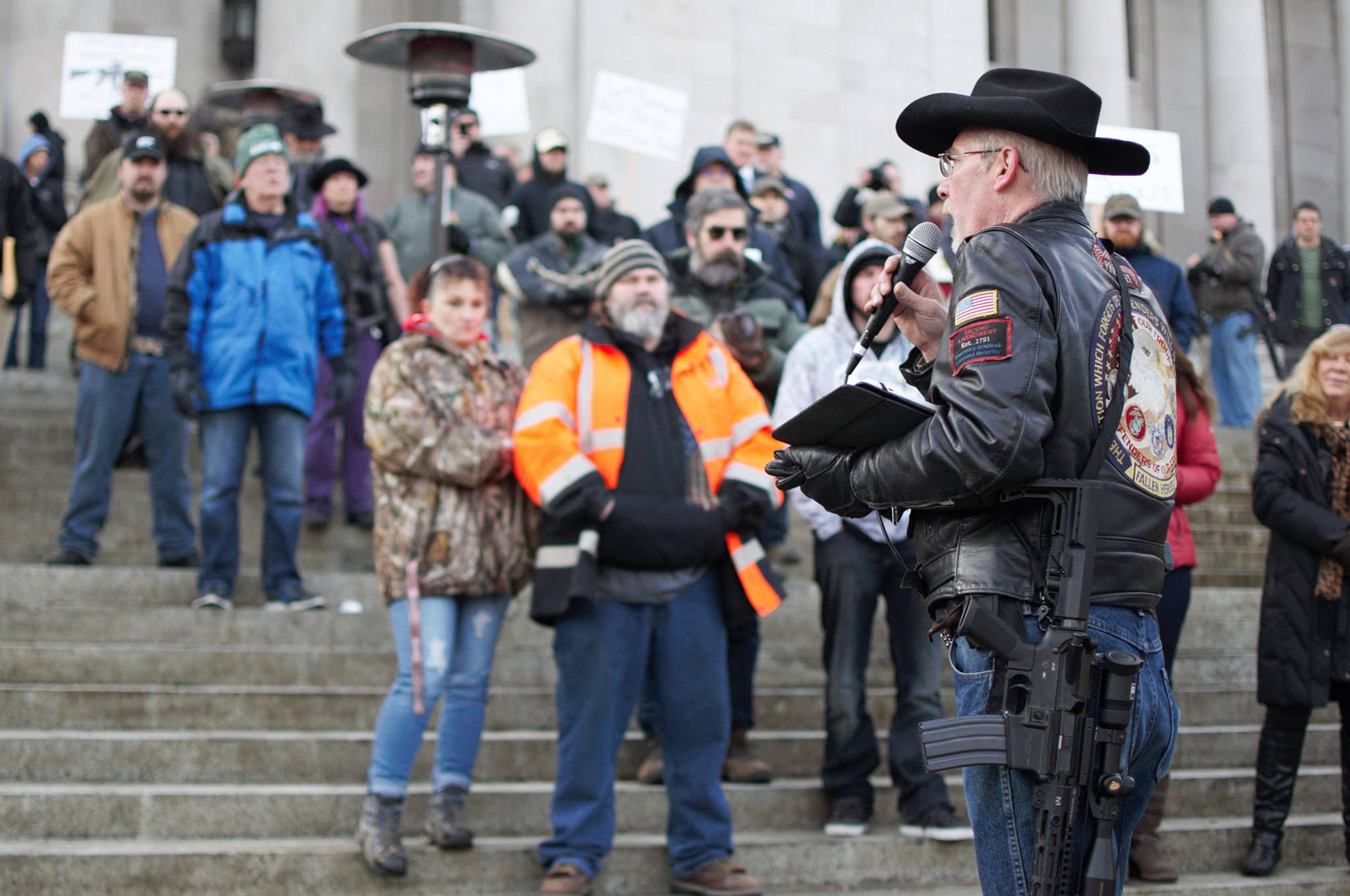 Rick Halle, national coordinator of the Gun Rights Coalition, addresses attendees to the Rally 4 UR Rights rally at the Washington State Capitol on Jan. 13. &ldquo;Gun rights is a non-partisan issue,&rdquo; Halle said, urging supporters to remember the second amendment is an American right, not just a conservative or Republican right. Various bills have been introduced to the Legislature regarding gun rights and control, including a bill that would require gun dealers to offer to sell or give a lock or lock box with every gun sale. COURTESY PHOTO, Enrique Pérez de la Rosa, WNPA Olympia News Bureau