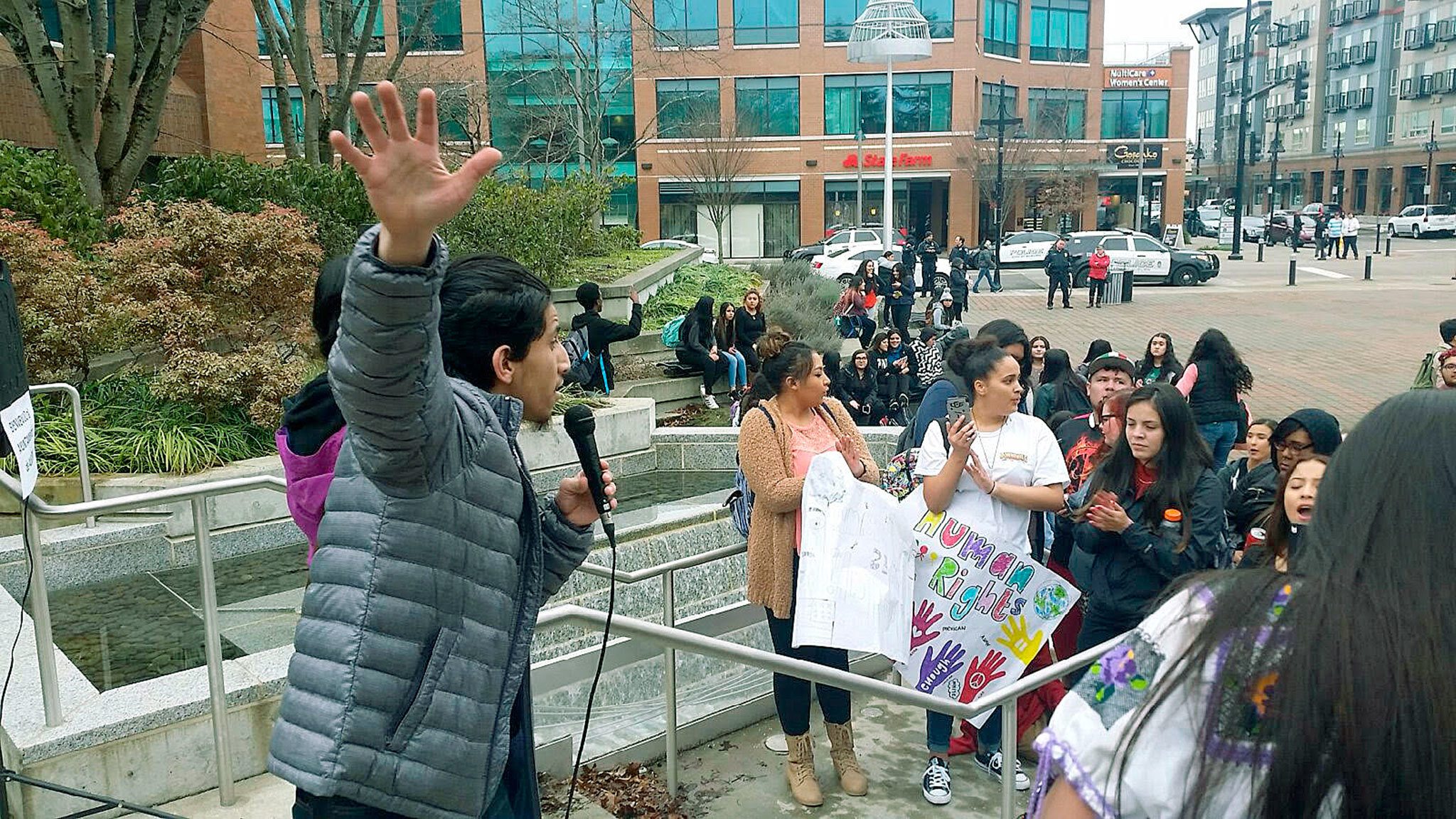 Activist Bryan Rivera exhorts a crowd of Auburn High School students urging City leaders to declare Auburn a sanctuary city during a rally at the steps of City Hall last Friday. ROBERT WHALE, Auburn Reporter
