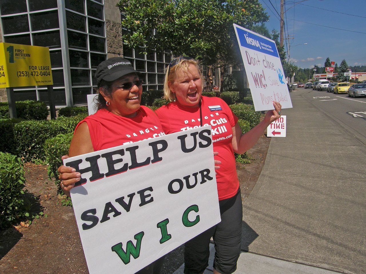 Back in the summer of 2014, nurses Christina Enriques and Hannah Welander participated in a rally to draw public attention to the proposed closure of King County’s Public Health Center in Auburn. Two years later, financial support has strengthened the center, which stands to remain open for several years to come. ROBERT WHALE, Auburn Reporter