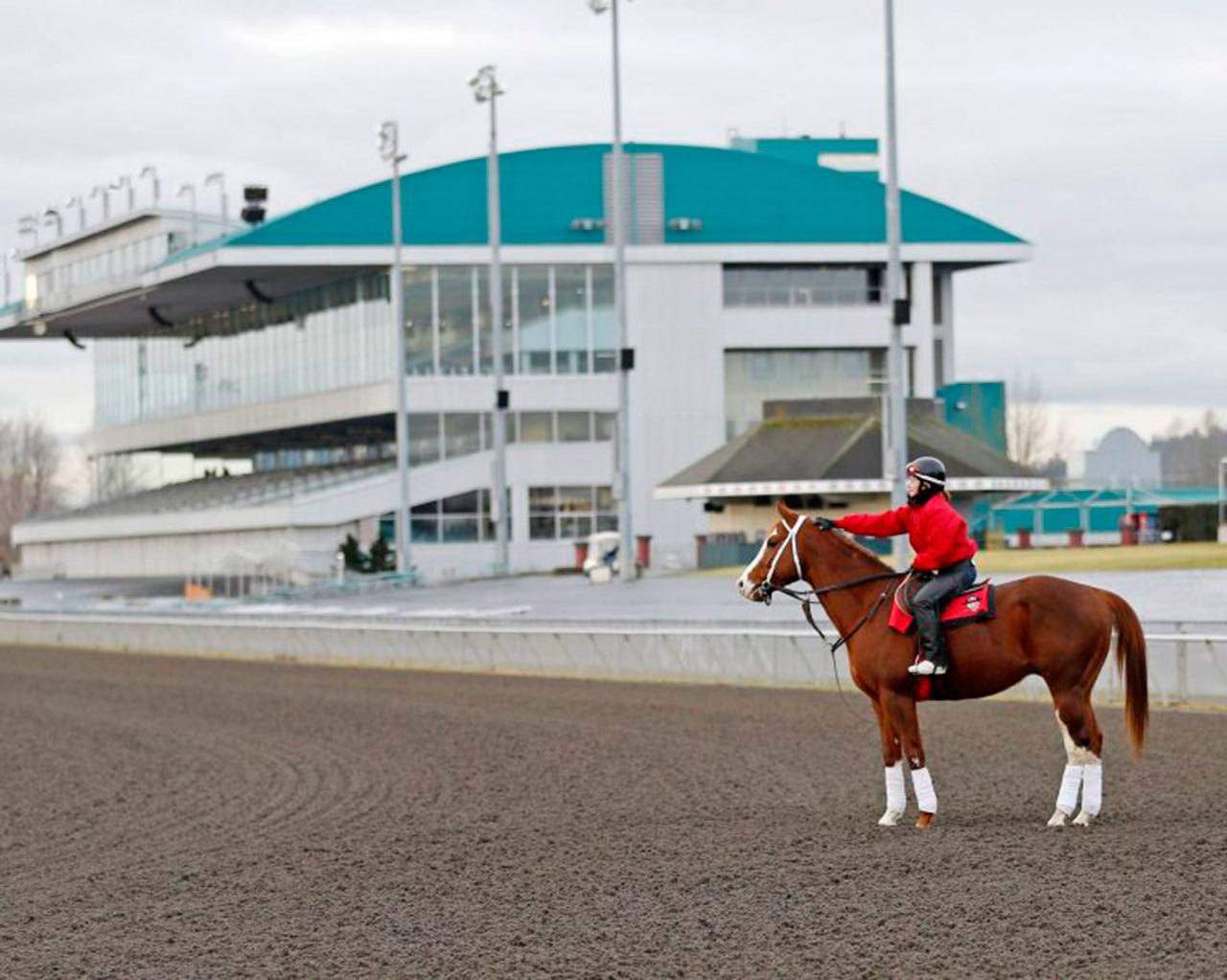 Barkley and jockey Jennifer Whitaker take to the well-groomed track at Emerald Downs on Monday, the first official day of training at the Auburn oval. COURTESY PHOTO, Emerald Downs
