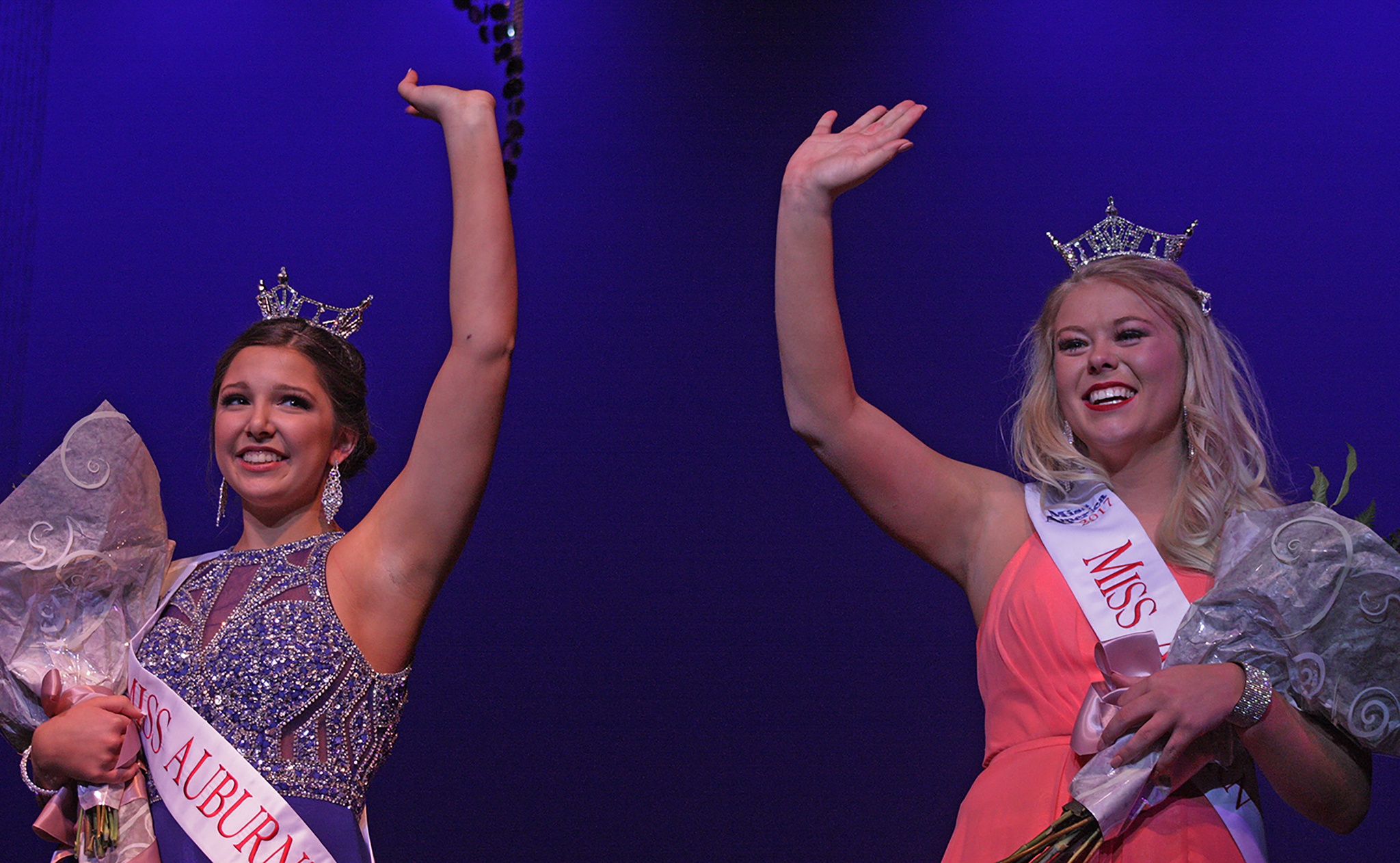 Newly crowned Miss Auburn Heather Haggin, right, and Miss Auburn’s Outstanding Teen Elizabeth Enz wave to the crowd at the coronation Saturday night. MARK KLAAS, Auburn Reporter