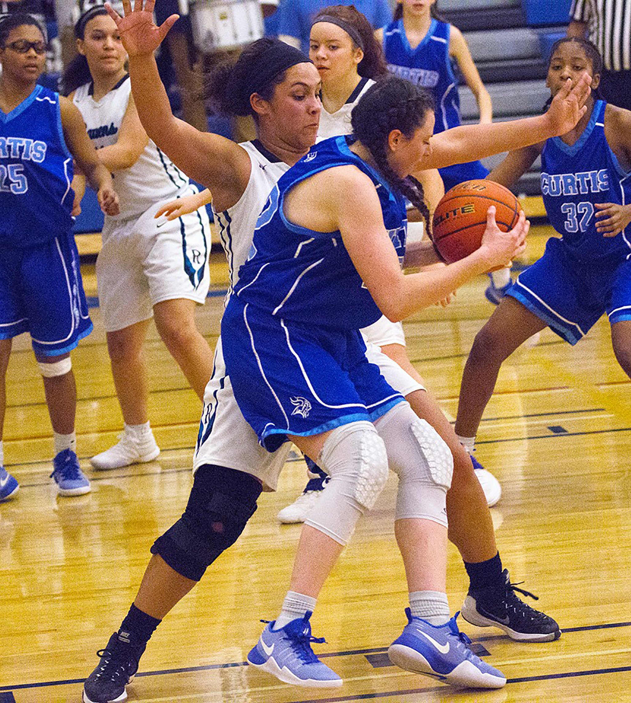 Katelyn Brown and her Auburn Riverside teammates withstood Curtis’ late challenge to secure a 58-52 win Friday night in the quarterfinal round of the West Central/Southwest 4A bi-district tournament at Stadium High School in Tacoma. Brown is one of six seniors on a veteran-laden Ravens’ roster who earned a second consecutive trip to the regional round of the state tournament, which runs Feb. 24-25, with their win against Curtis. Courtesy photo, Jeff Rhodes