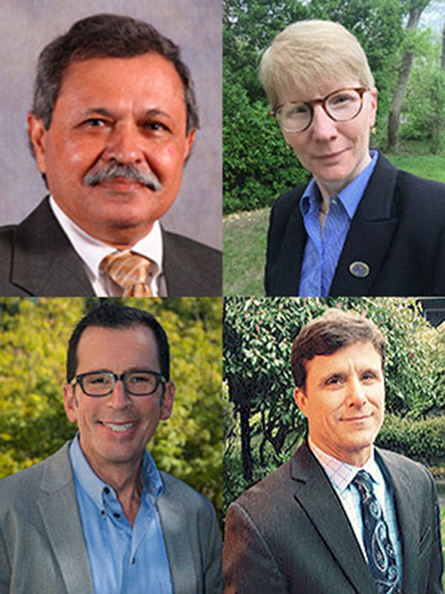 The four finalists in the search for Green River’s next president are, clockwise from top left: Utpal K. Goswami, Suzanne M. Johnson, Kenneth G. Lawson and Elliot Stern. COURTESY PHOTOS