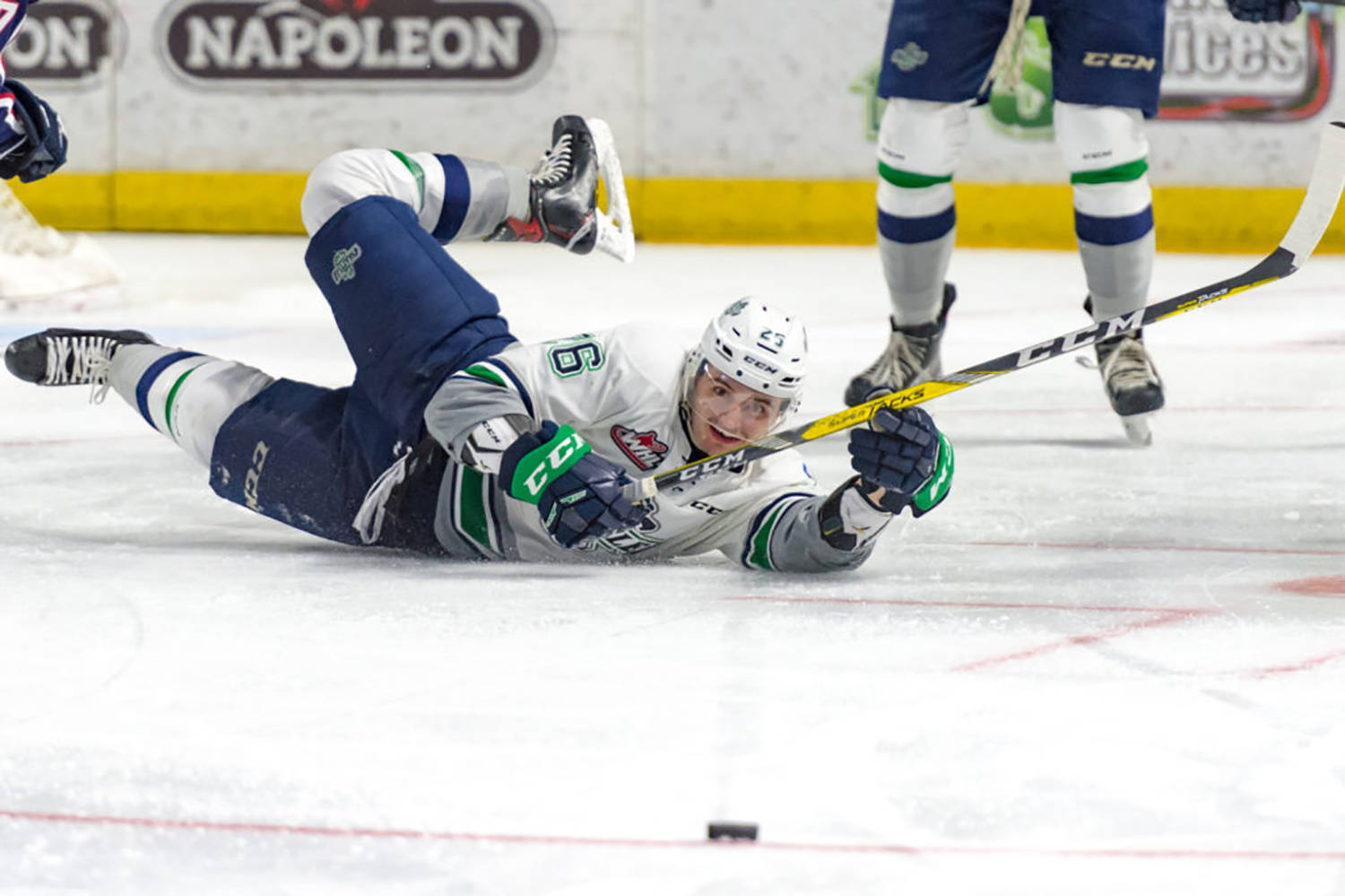 The Thunderbirds’ Nolan Volcan watches as he pushes the puck up the ice during playoff action against the Americans on Saturday night. COURTESY PHOTO, Brian Liesse/T-Birds