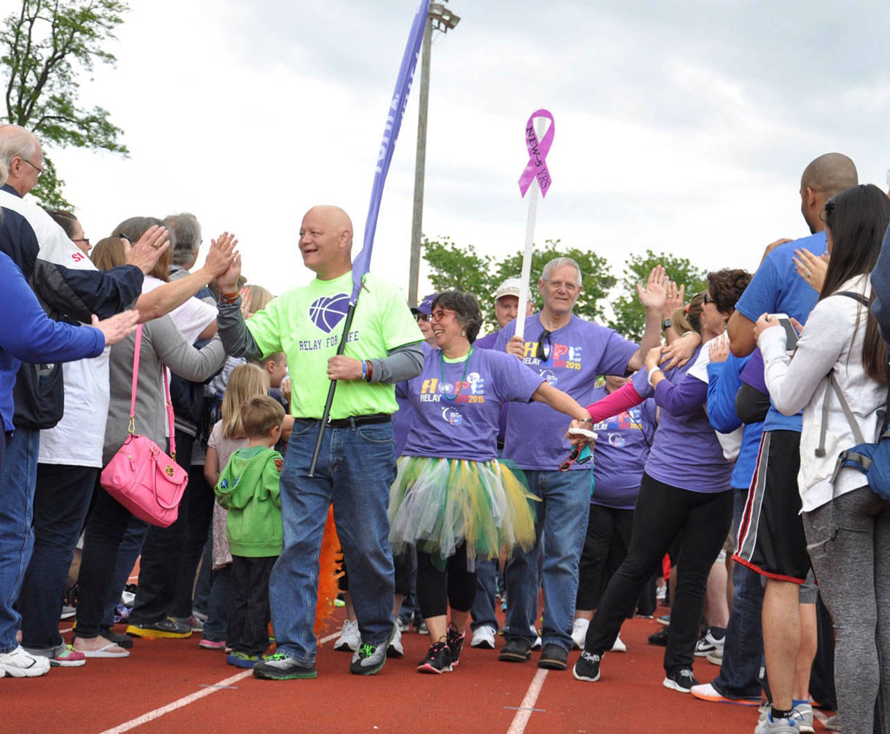 Bob Jones greets supporters during an Auburn Relay for Life event at Auburn Memorial Stadium in 2015. RACHEL CIAMPI, Auburn Reporter