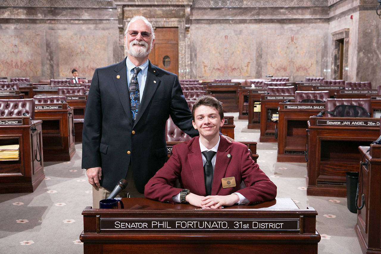 Antonio Fortunato joins his grandfather, Sen. Phil Fortunato, on the Senate floor in Olympia. COURTESY PHOTO, Washington State Legislature