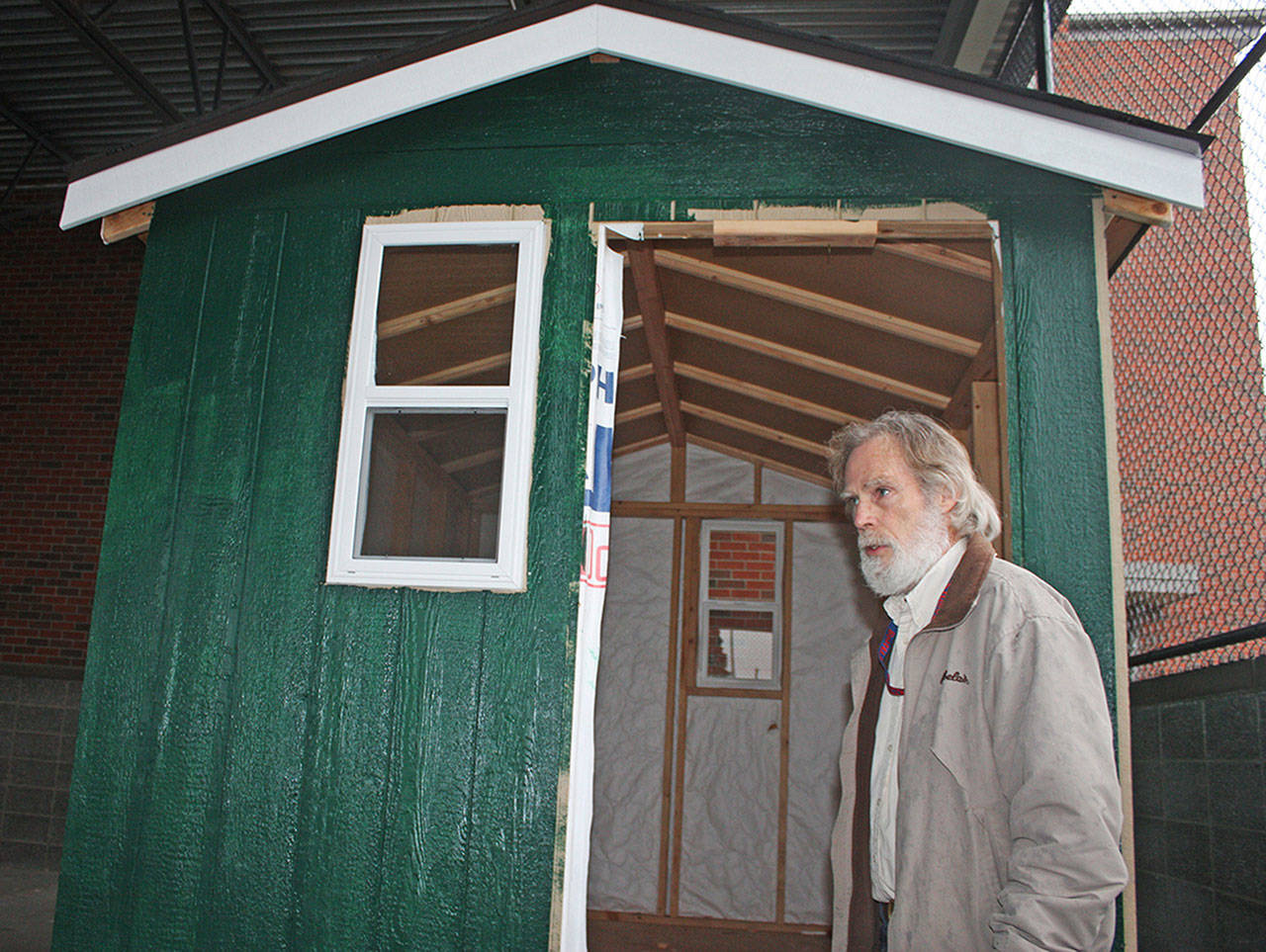 Jack McCarley’s students at Auburn High School have been busy assembling an 8-by-12-foot, portable, energy-efficient homeless shelter for a statewide competition. MARK KLAAS, Auburn Reporter