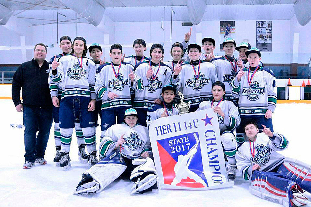 Best on ice: The Sno-King Amateur Hockey Association’s 14U Junior Thunderbirds celebrate after taking the Washington state championship in Spokane on March 19. COURTESY PHOTO