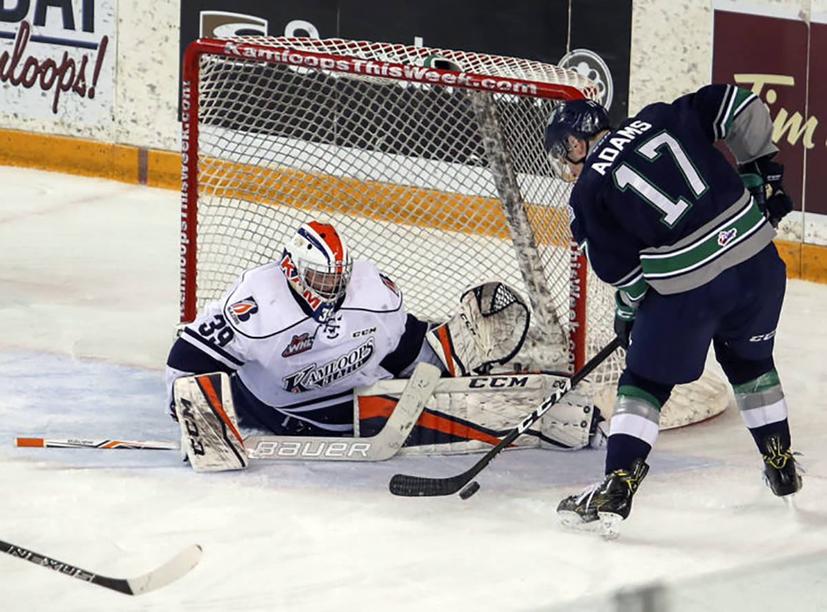 The Thunderbirds’ Tyler Adams attempts a shot at Blazers goalie Connor Ingram during WHL play Wednesday night. COURTESY PHOTO, Allen Douglas