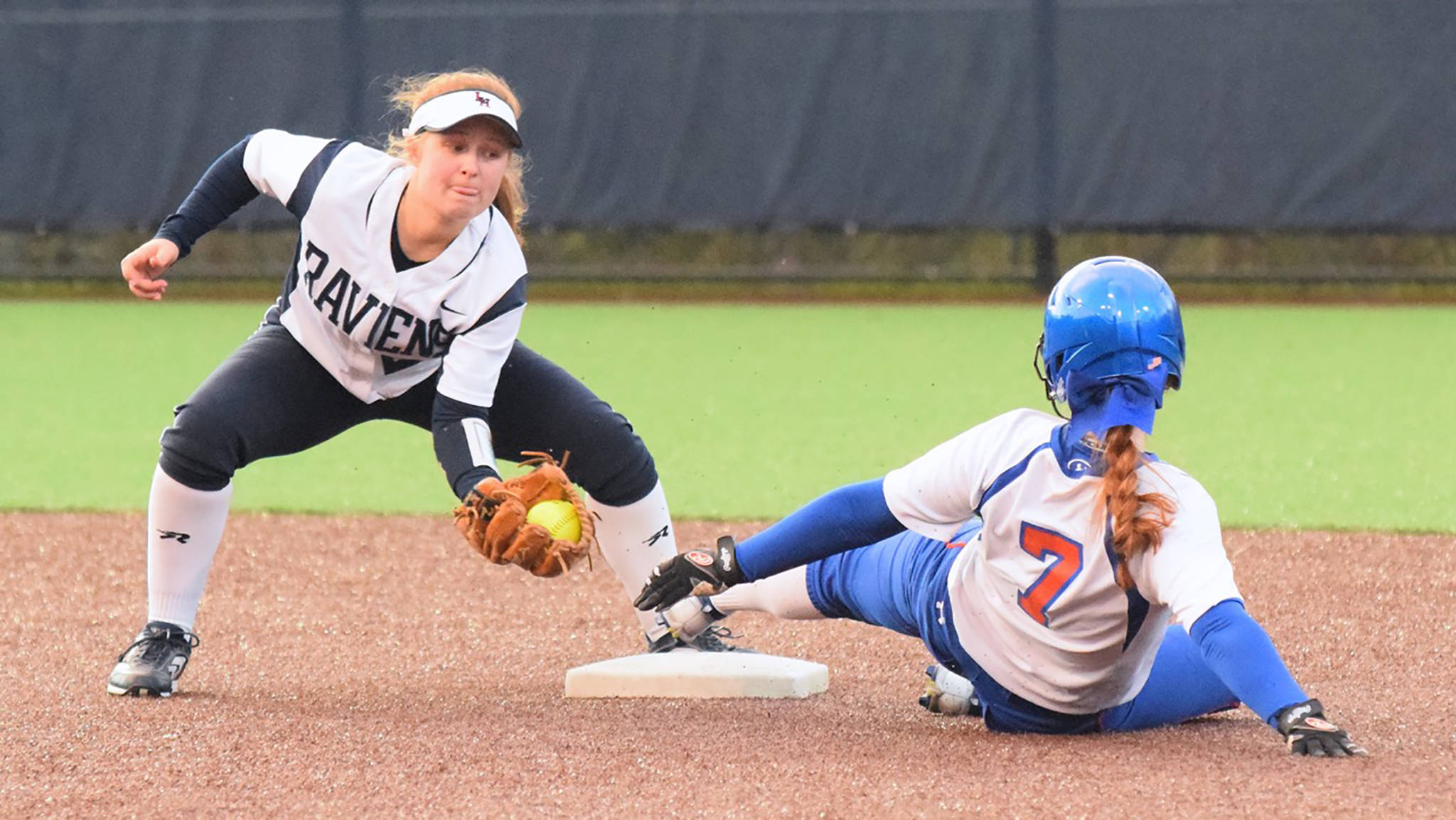 Auburn Mountainview’s Lily Hope slides safely into second base as Auburn Riverside’s Brooke Dye fields the ball during NPSL Olympic Division play Monday. RACHEL CIAMPI, Auburn Reporter