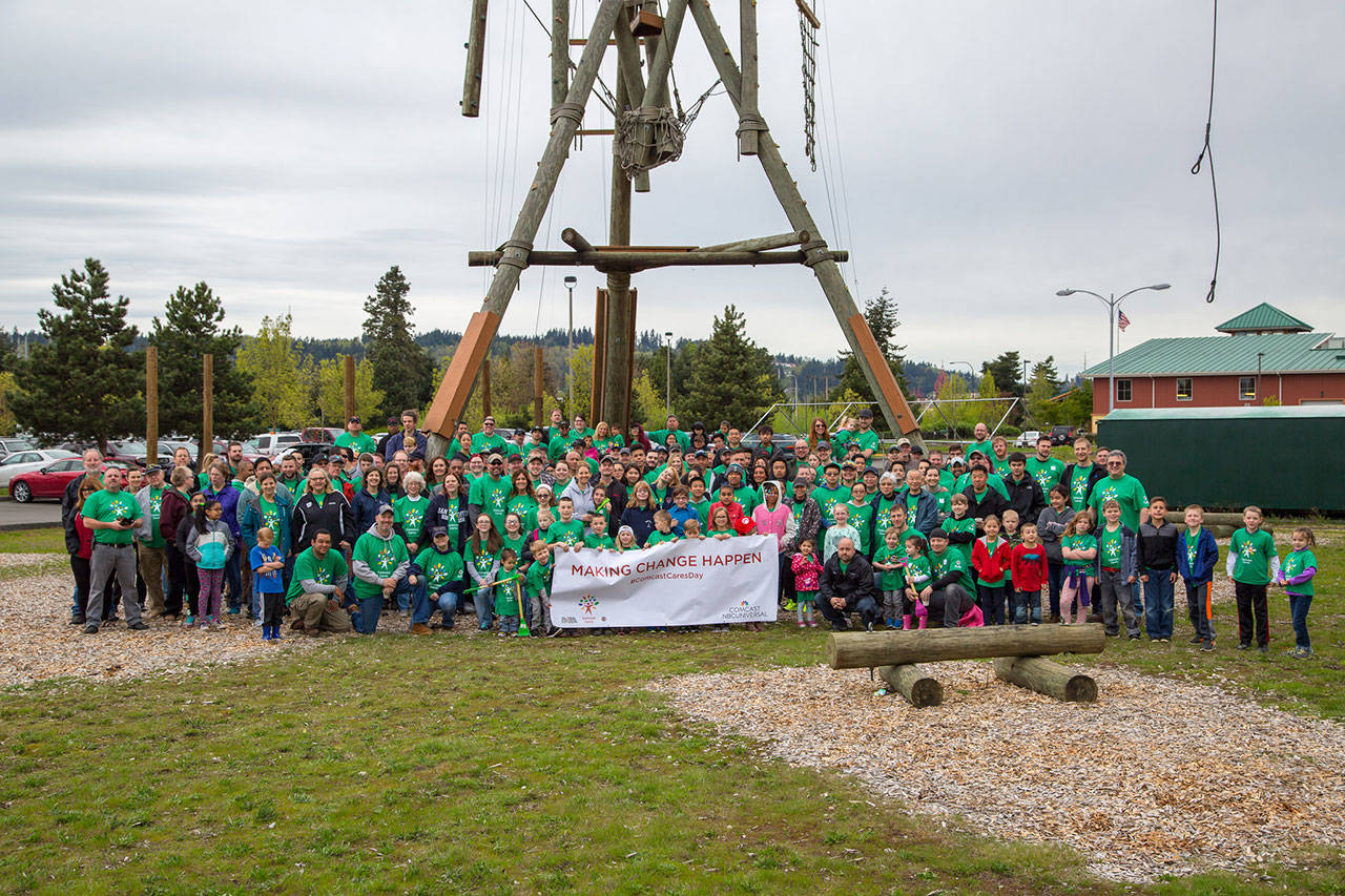 Nearly 250 Comcast employees, family and friends helped beautify the Auburn Valley YMCA last Saturday. COURTESY PHOTO