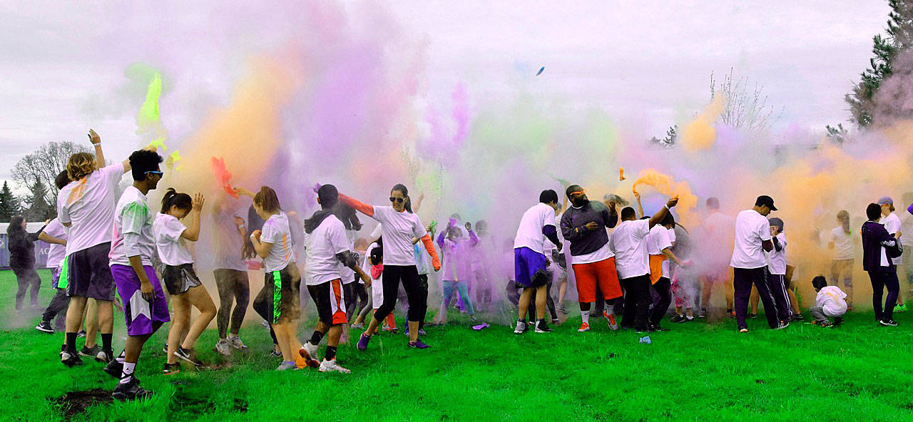 Participants powder a rainbow-like sky prior to the start of the Run2Educate Color Run at Buena Vista Seventh-day Adventist School last Sunday. RACHEL CIAMP, Auburn Reporter