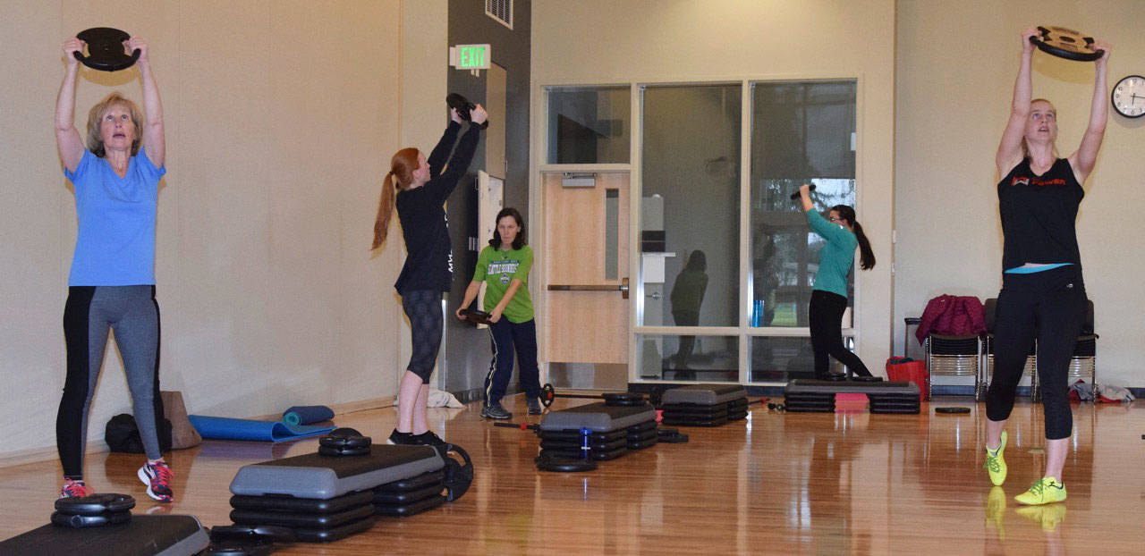 Amanda Phanor leads a Group Power workout class at the Auburn Community & Event Center. The City offers a variety of fitness classes. RACHEL CIAMPI, Auburn Reporter