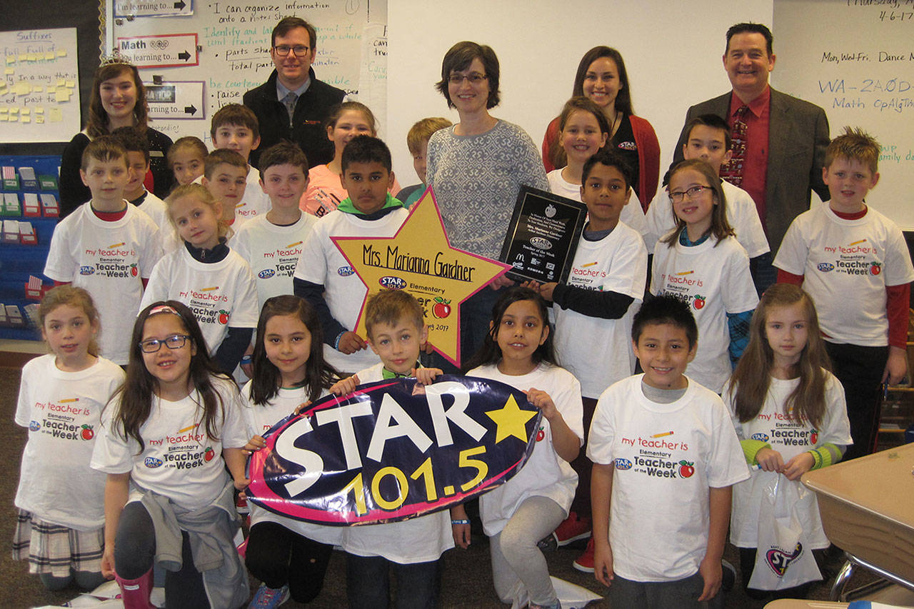 Marianne Gardner and her third-grade class at Arthur Jacobsen got a surprise when she was presented with the STAR 101.5 Elementary Teacher of the Week award on April 6. COURTESY PHOTO