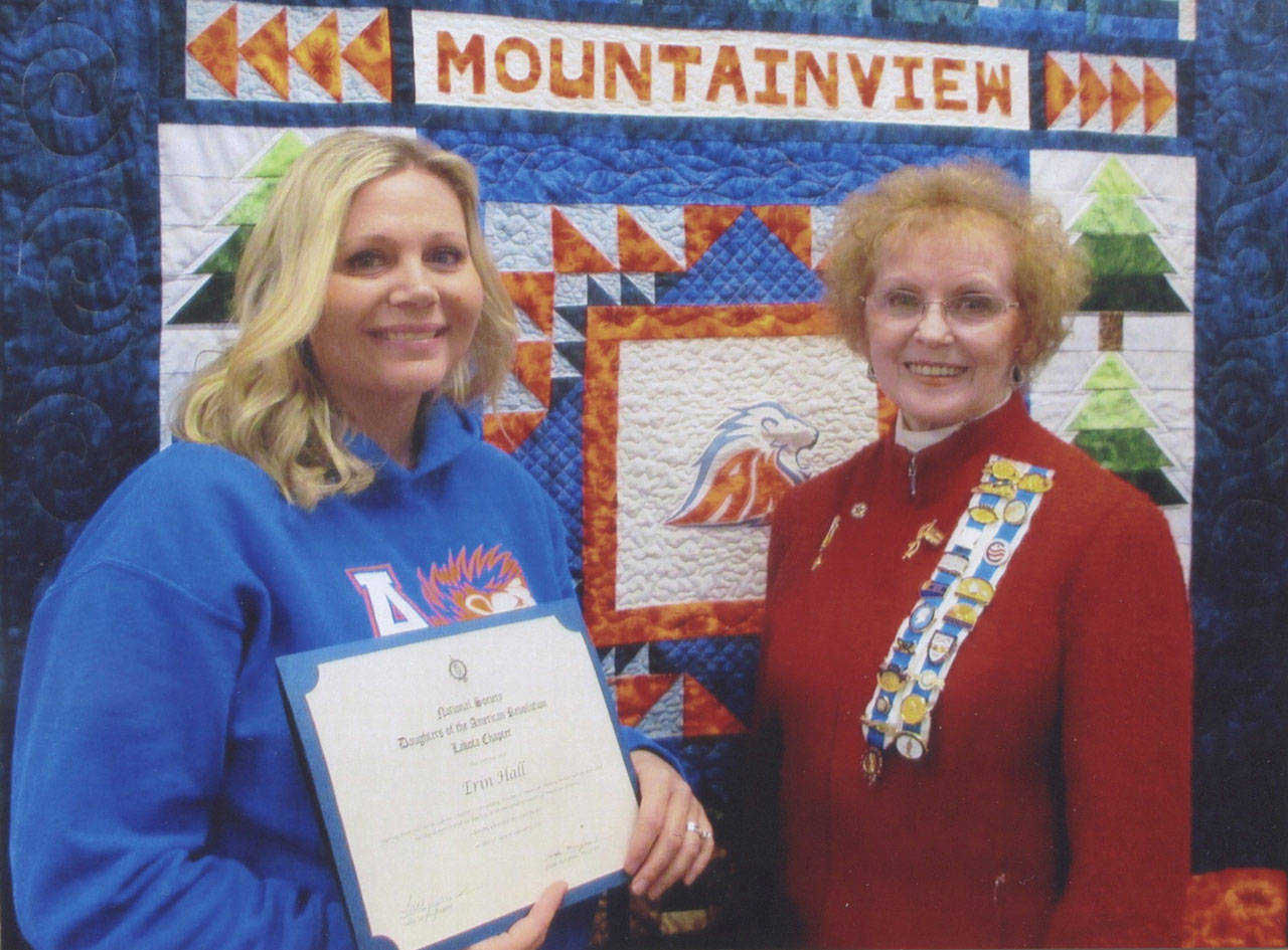 With Erin Hall, left, is Hilda Meryhew, national defense chair for the Lakota Chapter of the Daughters of the American Revolution. COURTESY PHOTO