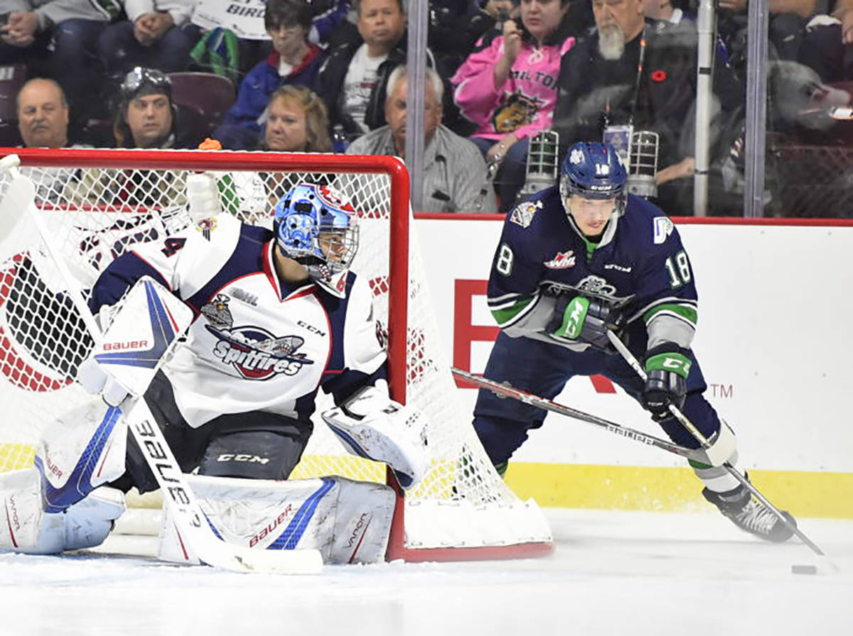 The Thunderbirds’ Sam Moilanen maneuvers to take a shot at Spitfires goalie Michael DiPietro during Memorial Cup play Sunday. COURTESY PHOTO, Aaron Bell/CHL Images