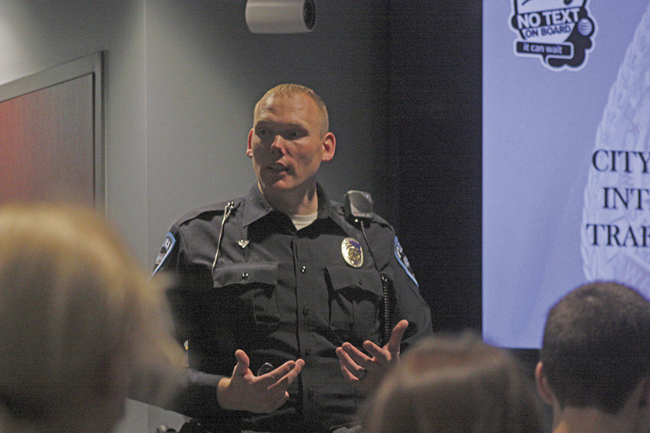 Auburn Police Officer Derek Anderson talks to teen drivers at traffic school last week. MARK KLAAS, Auburn Reporter