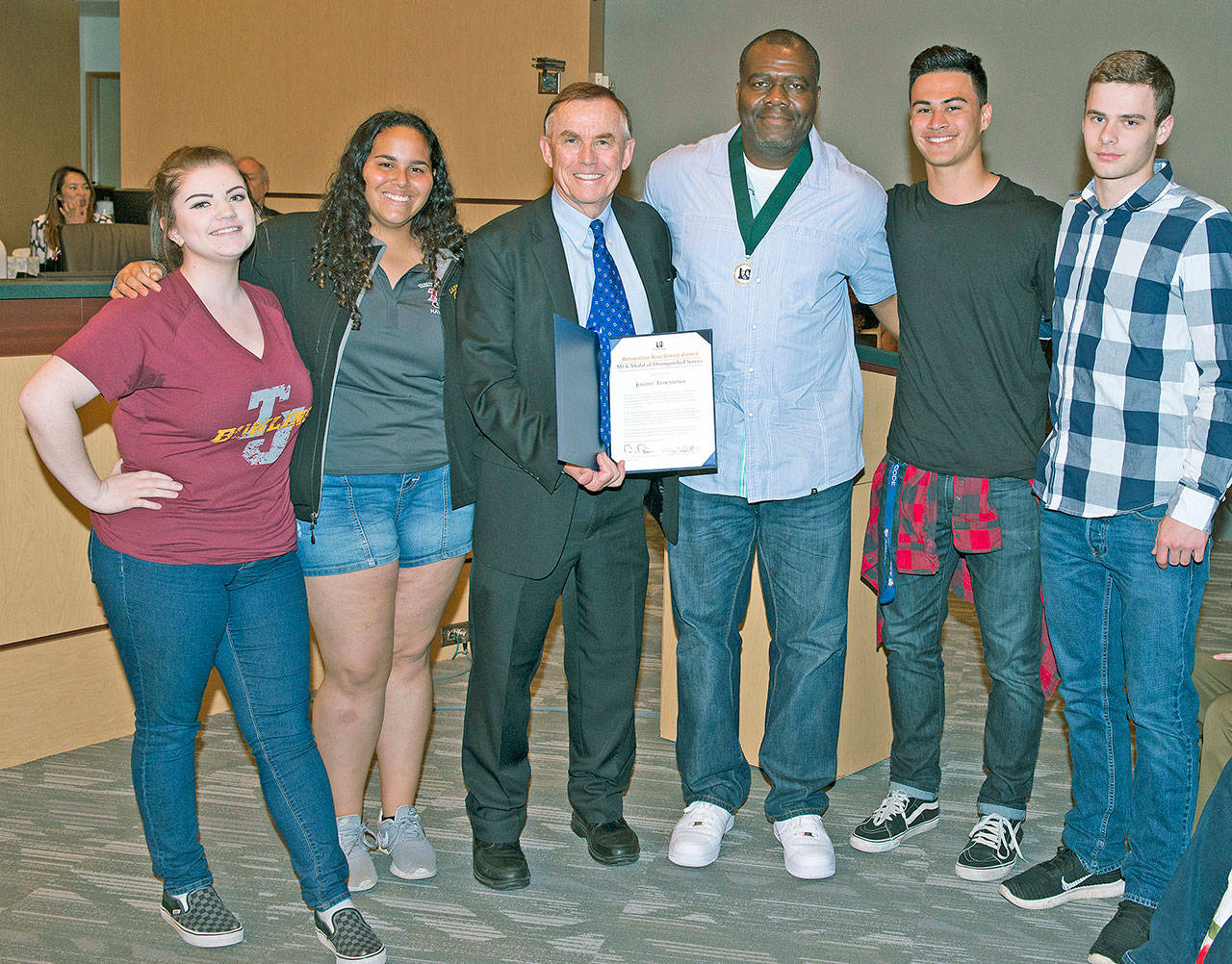 At the presentation are, from left: Thomas Jefferson students Cassie Lee and Haylee Pollard; King County Councilmember Pete von Reichbauer; Jefferson coach and MLK Medal recipient Joseph Townsend; and students Mason DeLaCruz and Avery Cantino-Kennedy. COURTESY PHOTO