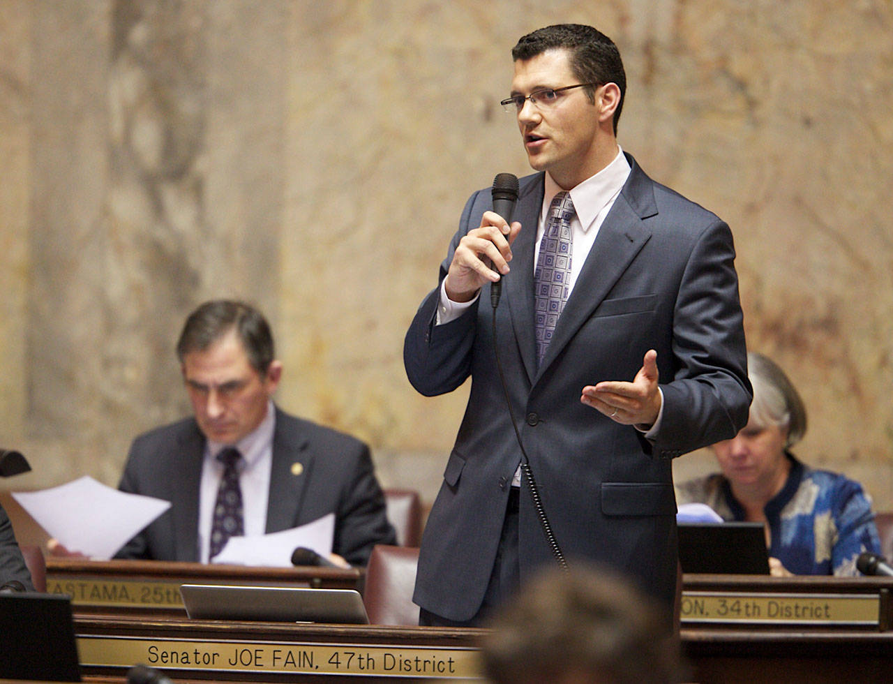Joe Fain, R-Auburn, speaking on the Senate floor in Olympia, worked to the brink to help broker a deal to fully fund education. COURTESY PHOTO
