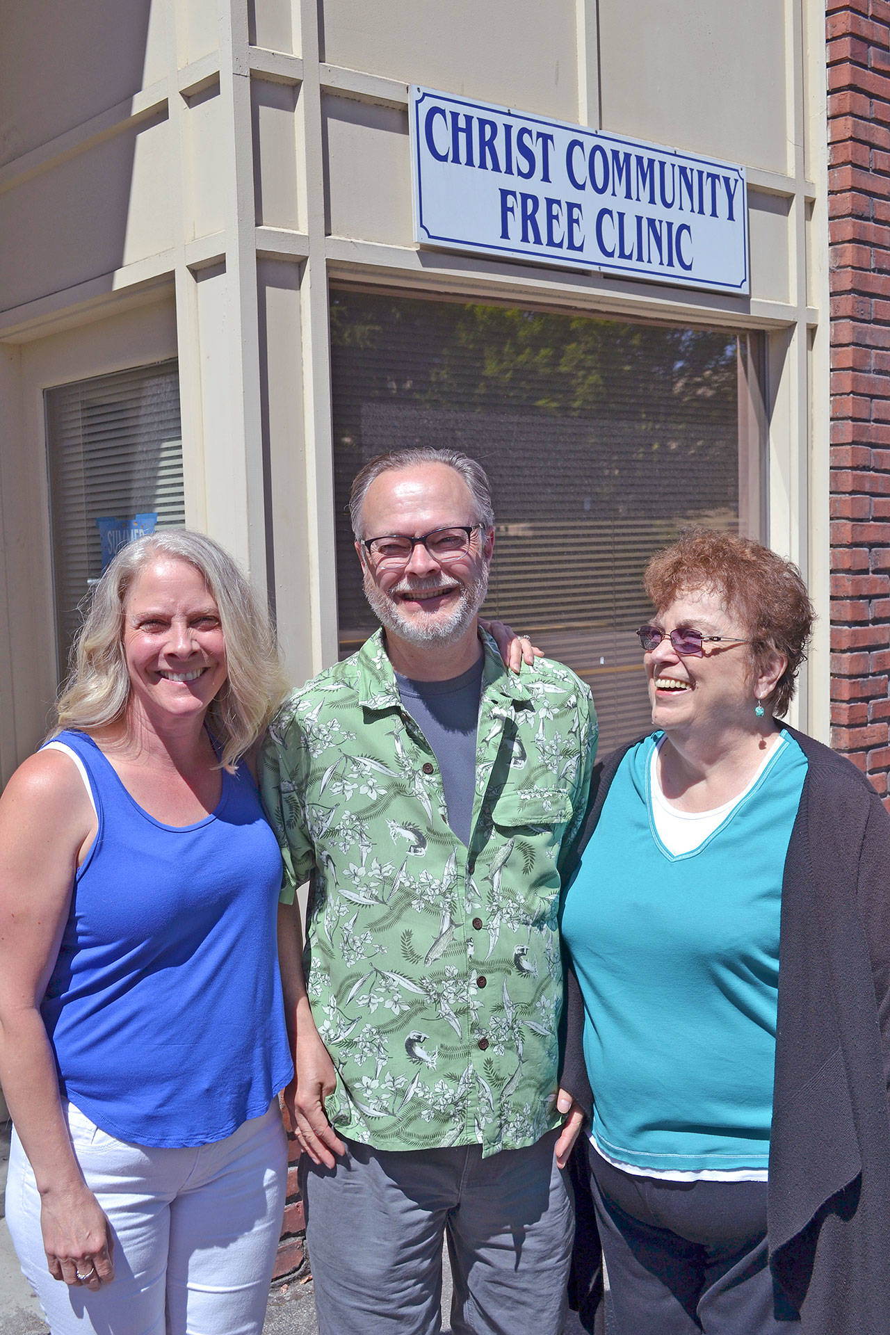 Looking for volunteer doctors, dentists, nurses, hygienists and assistants to help out at Christ Community Free Clinic at 1 A St. NW are from left, Dental Coordinator Judy Bluhm, Board Member Jeff Johnson and Executive Director Ginny Gannon. ROBERT WHALE, Auburn Reporter