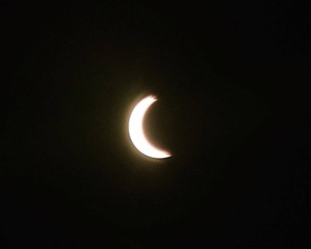 Reporter photographer Rachel Ciampi captured the evolving solar eclipse from Auburn on Monday morning.