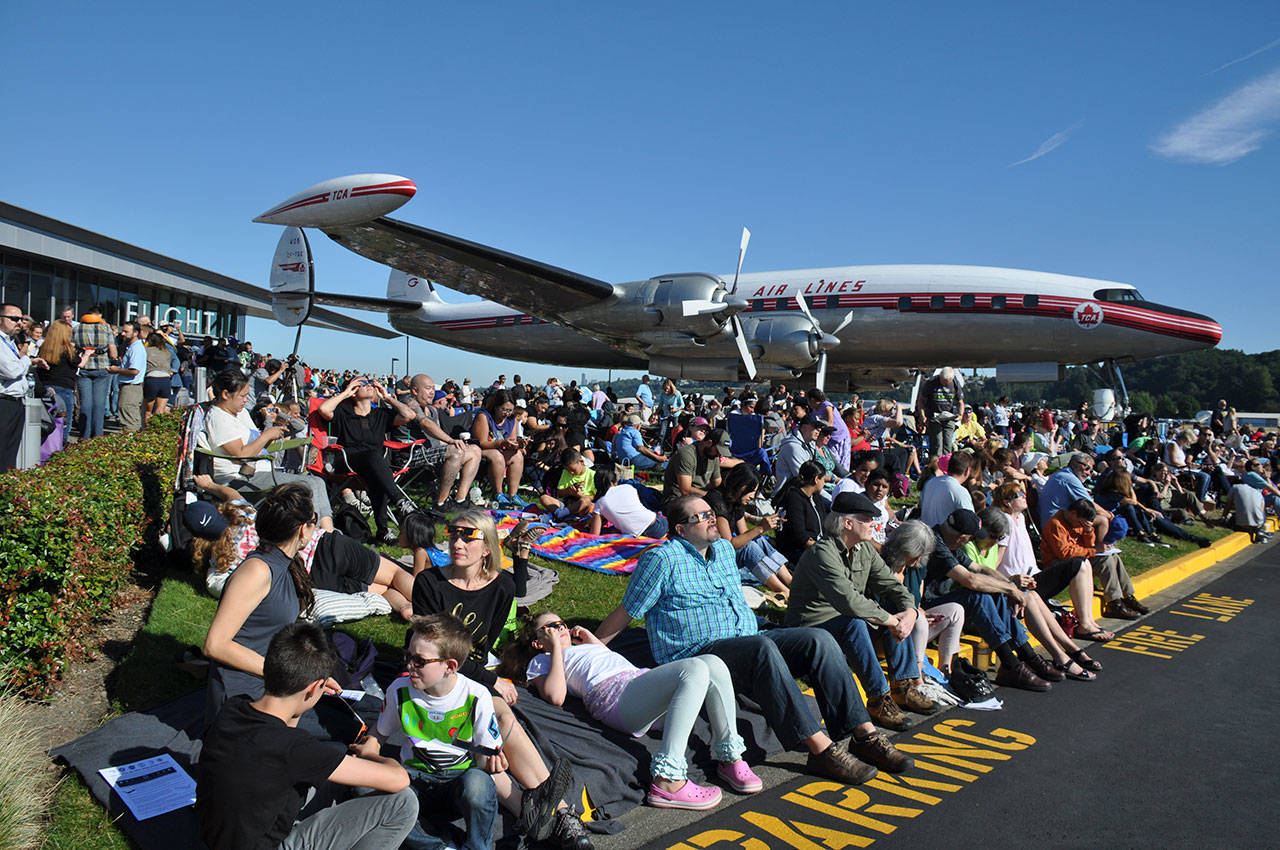 Spectators await the solar eclipse on Monday morning at the Museum of Flight. HEIDI SANDERS, Reporter