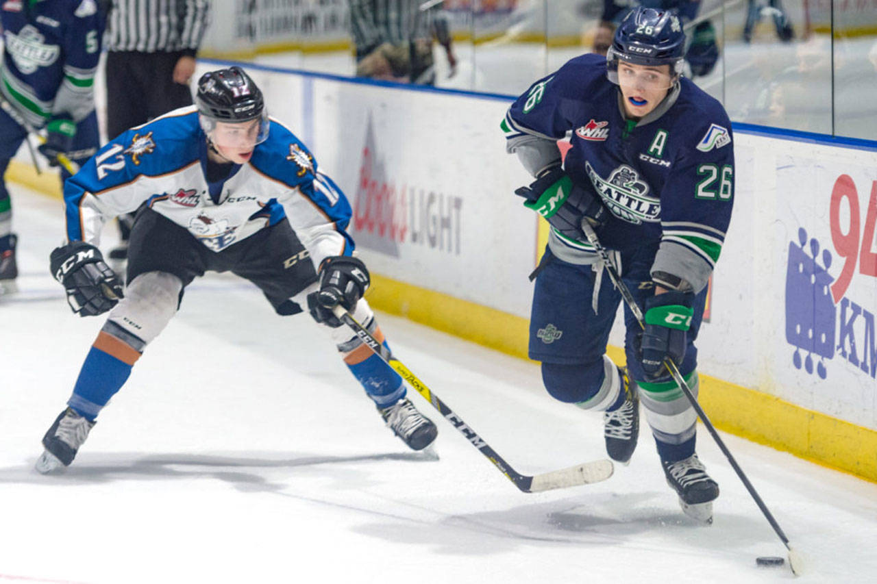 Kootenay’s Noah Philp defends the Thunderbirds’ Nolan Volcan during play last season. Philp was traded Monday to the T-Birds. COURTESY PHOTO, Brian Liese, Thunderbirds