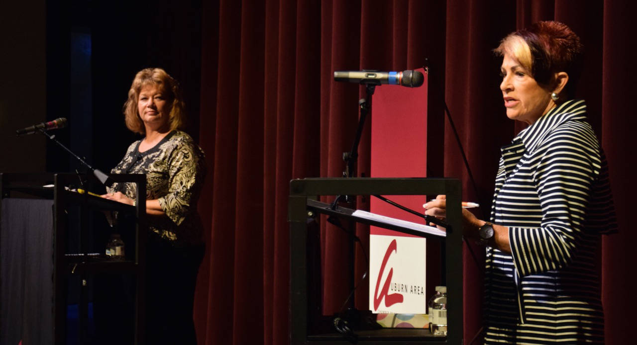 Deputy Mayor Largo Wales, right, fields a question as Mayor Nancy Backus listens during a mayoral debate at the Auburn Performing Arts Center on Wednesday night. The Auburn Area Chamber of Commerce presented the debate. RACHEL CIAMPI, Auburn Reporter