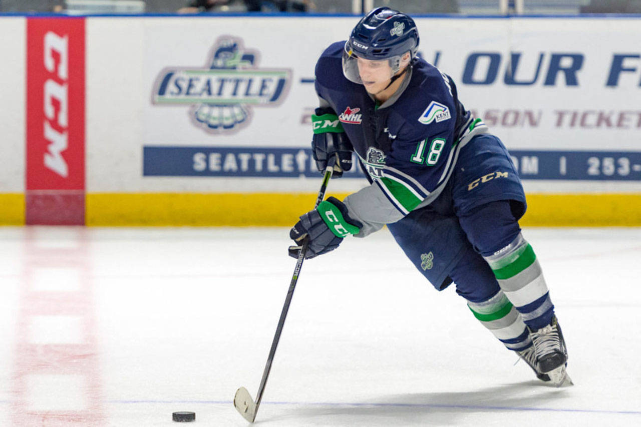 The Thunderbirds’ Sami Moilanen brings the puck up the ice against the Giants during WHL play Tuesday night. COURTESY PHOTO, Brian Liesse, T-Birds