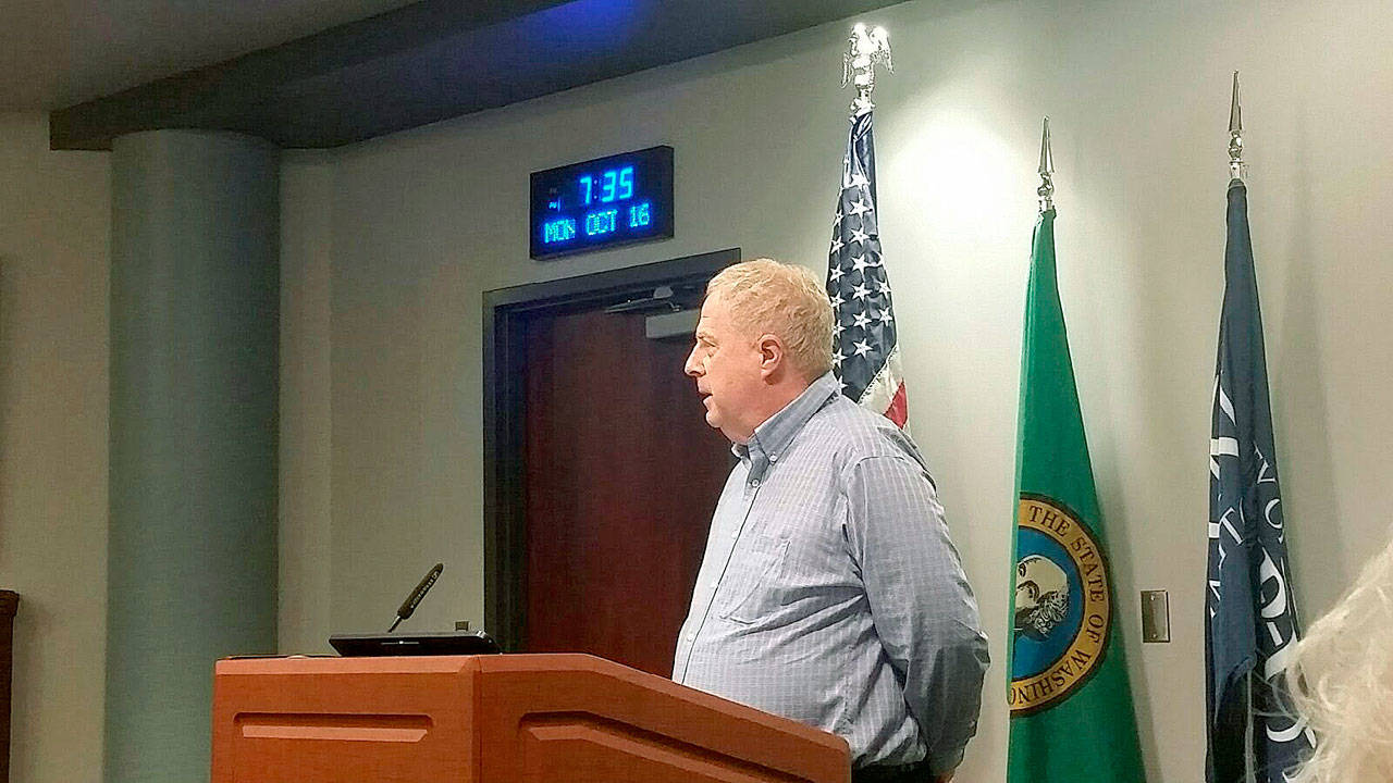 Jeff Oliphant addresses the Auburn City Council Monday evening before its vote to recommend Sound Transit pick the old Mels Lumber property as the site for the second transit parking garage. ROBERT WHALE, Auburn Reporter