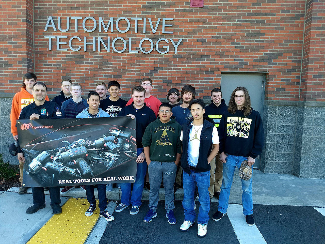 Auburn School District automotive students after the grant award was announced. COURTESY PHOTOS