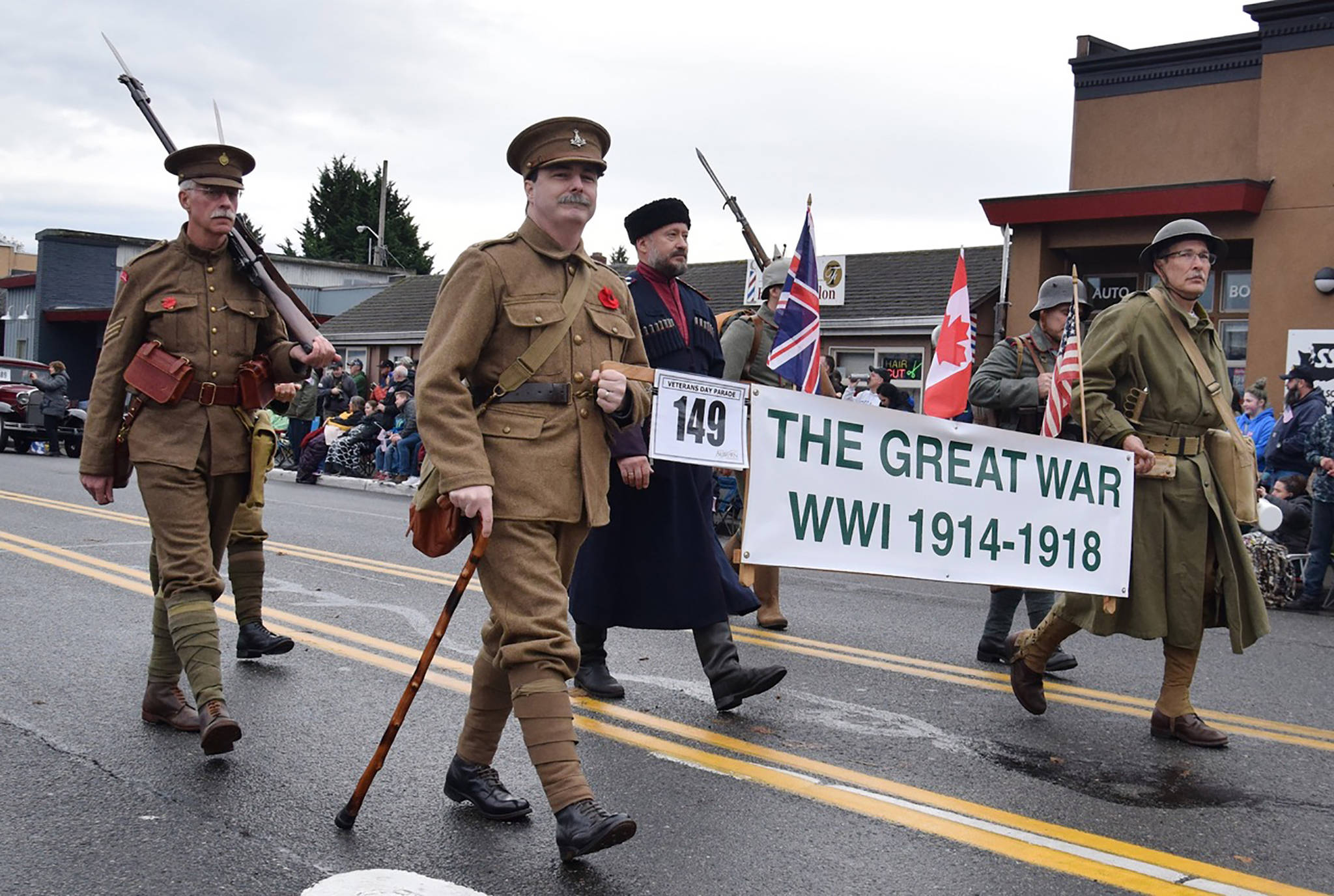 Soldiers dressed in World War I uniforms march down Main Street on Saturday. The parade featured more than 200 entries and nearly 6,000 parade participants showcasing American strength of will, endurance and purpose. RACHEL CIAMPI, Auburn Reporter