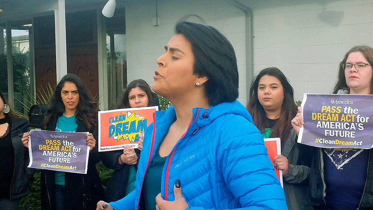 Monserat Padilla, 25, pleads for U.S. Rep. Dave Reichert to follow through on his noble words about immigration and help pass a ‘Clean Dream Act’ before the end of the year. ROBERT WHALE, Auburn Reporter