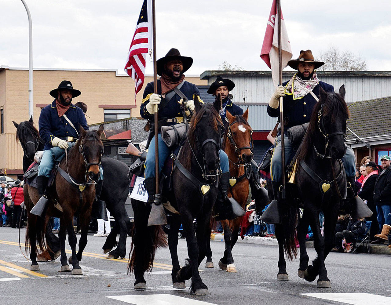 The Buffalo Soldiers of Seattle received the Veteran’s Award for Best Non-Motorized Entry at the Auburn parade. RACHEL CIAMPI, Auburn Reporter