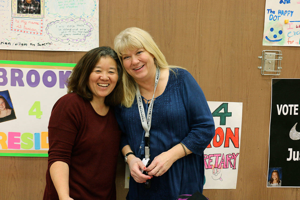 Tammy Heydon, left, and Lisa Acevedo teamed up to coordinate the clothing drive. COURTESY PHOTO, Auburn School District