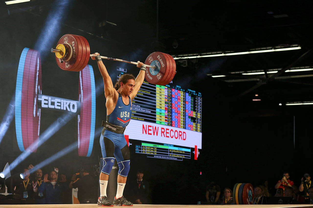 Harrison Maurus, 17, of Auburn, breaks the International Weightlifting Federation youth world record in the clean and jerk with a lift of 425.49 pounds at the World Weightlifting Championships in Anaheim, Calif., on Saturday, Dec. 2. COURTESY PHOTO, Joseph McCray, LiftingLife/USA Weightlifting