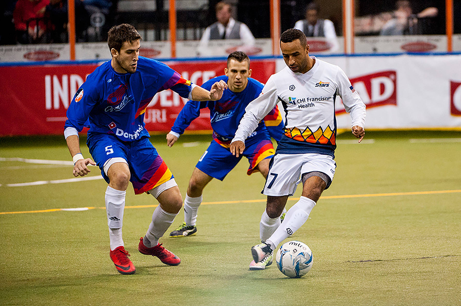 The Stars’ Raphael Cox, right, dribbles the ball with a pair of Comets defenders close by during MASL play. COURTESY PHOTO, Amy Kontras
