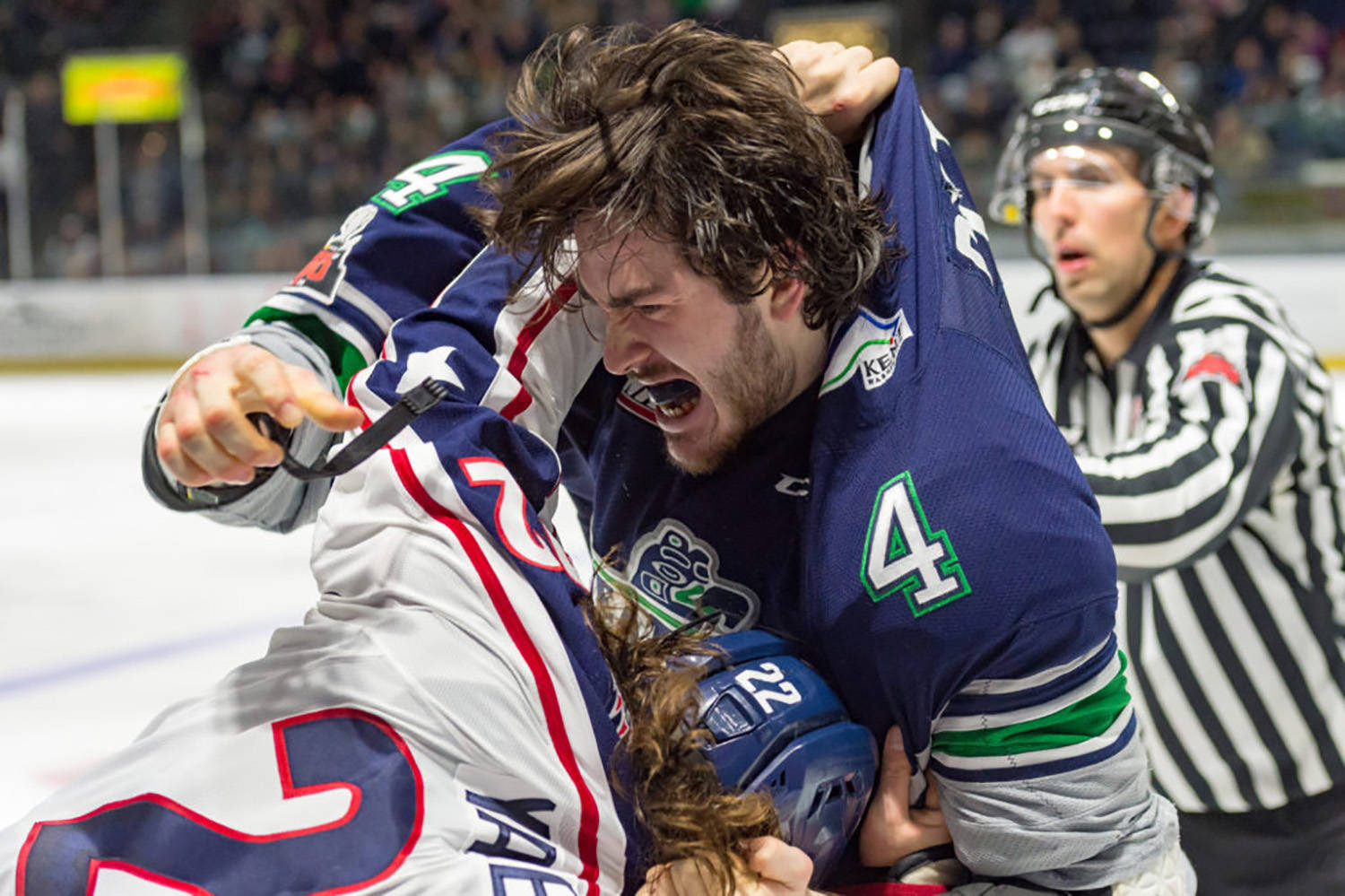 Thunderbirds enforcer Turner Ottenbreit scuffles with the Americans’ Nolan Yaremko during WHL play Friday night at the accesso ShoWare Center. COURTESY PHOTO, Brian Liesse/T-Birds
