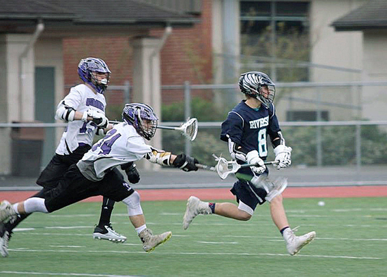 Auburn Riveride’s Tommy Belcher advances the ball during play last season. COURTESY PHOTO