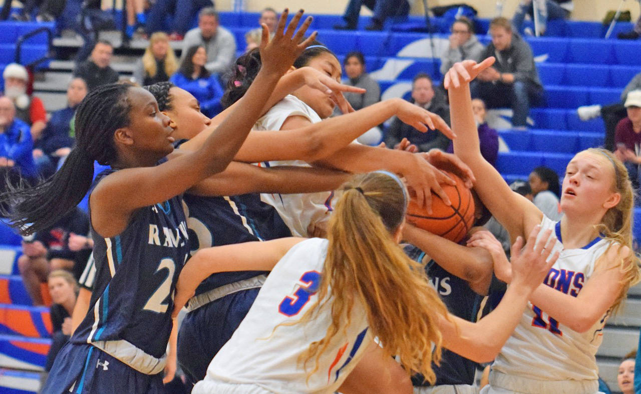 Arms race: Auburn Mountainview and Auburn Riverside players battle for the ball during NPSL Olympic Division play Thursday night in the Lions den. RACHEL CIAMPI, Auburn Reporter