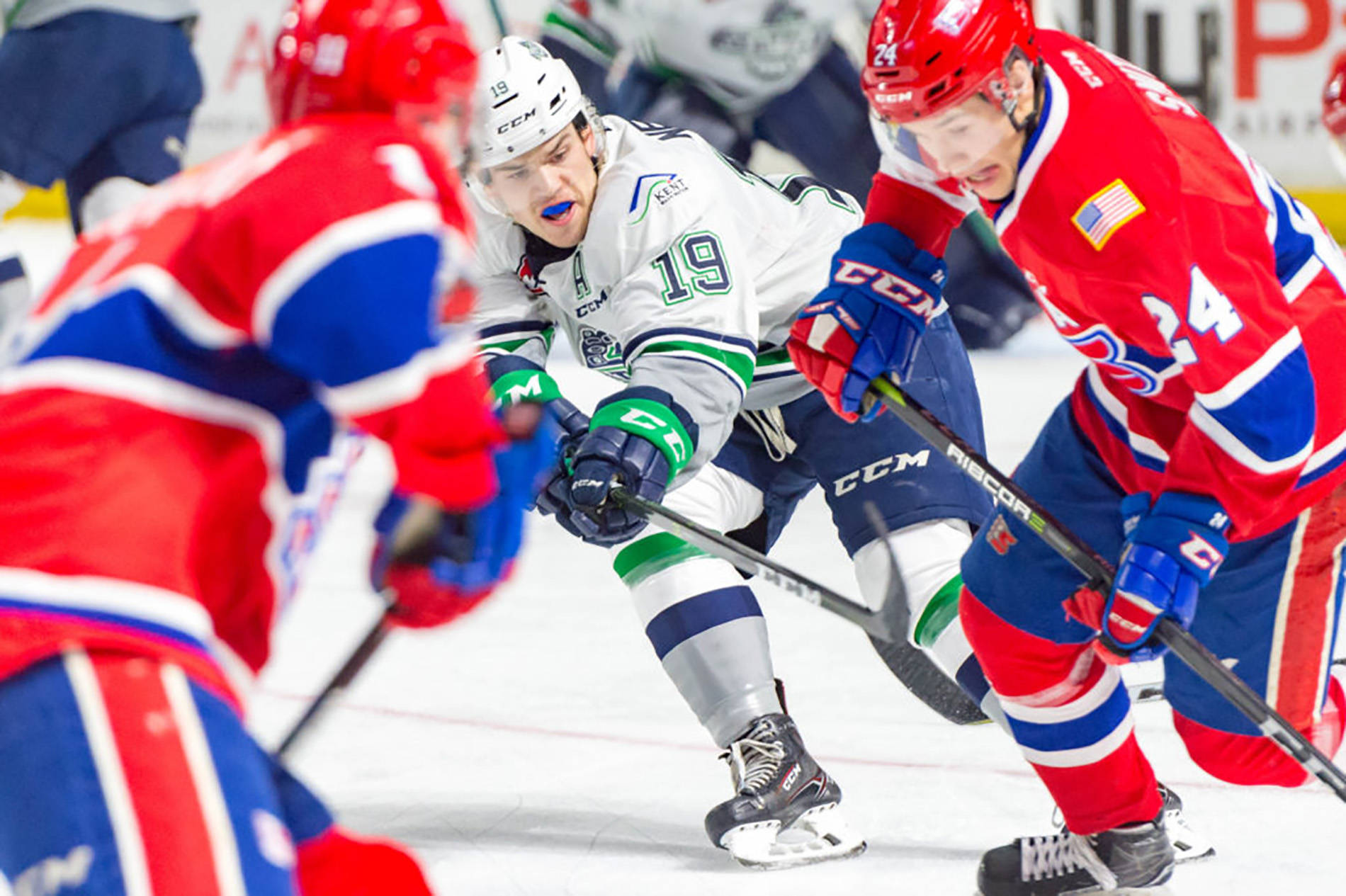 Thunderbirds center Donovan Neuls fights for the puck during WHL play against Spokane on Saturday night at the accesso ShoWare Center. COURTESY PHOTO, Brian Liesse/T-Birds