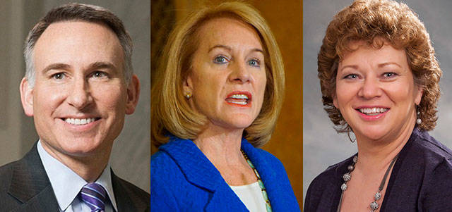 Dow Constantine, Jenny Durkan and Nancy Backus. FILE PHOTOS