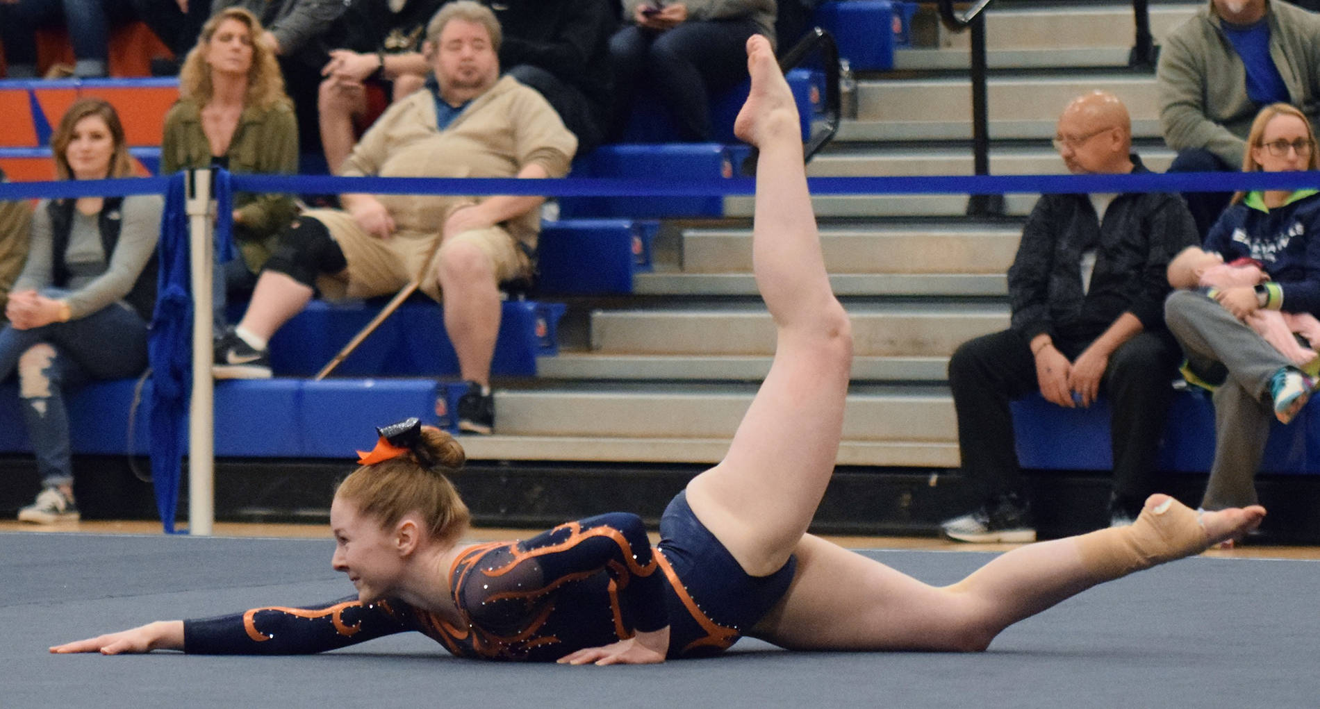 Auburn Mountainviews Regan Singer performs her routine on the floor during the 4A West Central District finals Saturday. Singer scored a 9.0, adding to the Lions state-qualifying team score. RACHEL CIAMPI, Auburn Reporter