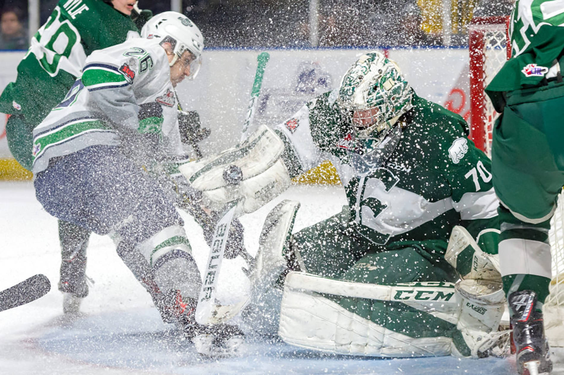 The Thunderbirds’ Nolan Volcan tries to fire the puck past Silvertips goalie Carter Hart during WHL play Saturday night. COURTESY PHOTO, Brian Liesse, T-Birds